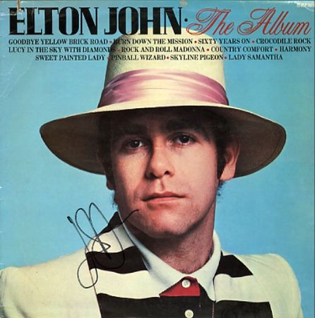 Lot #947 Elton John - Image 1