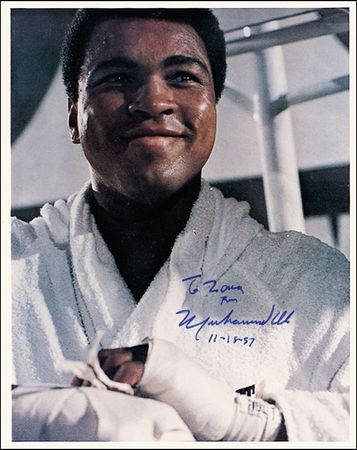 Lot #1303 Muhammad Ali - Image 1