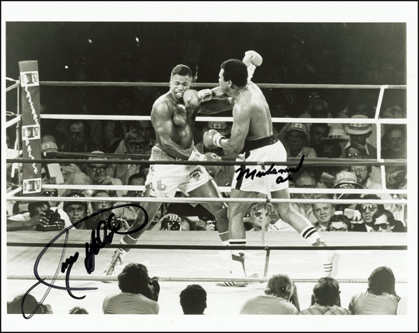 Lot 1100 Muhammad Ali and Larry Holmes