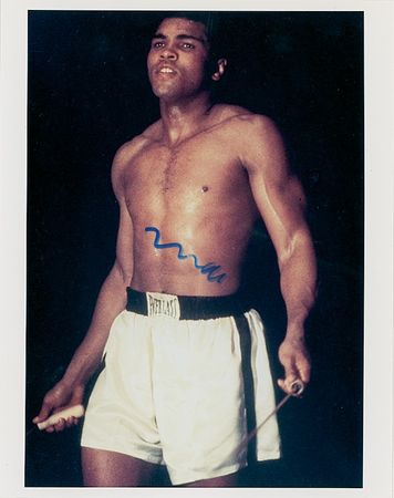 Lot #1192 Muhammad Ali - Image 1