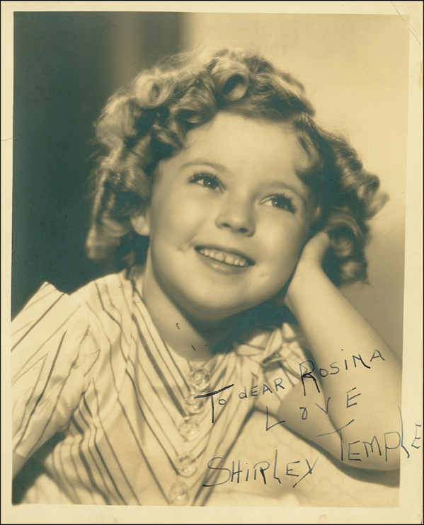 Lot 1087 Shirley Temple: Signing for a Little Rascal