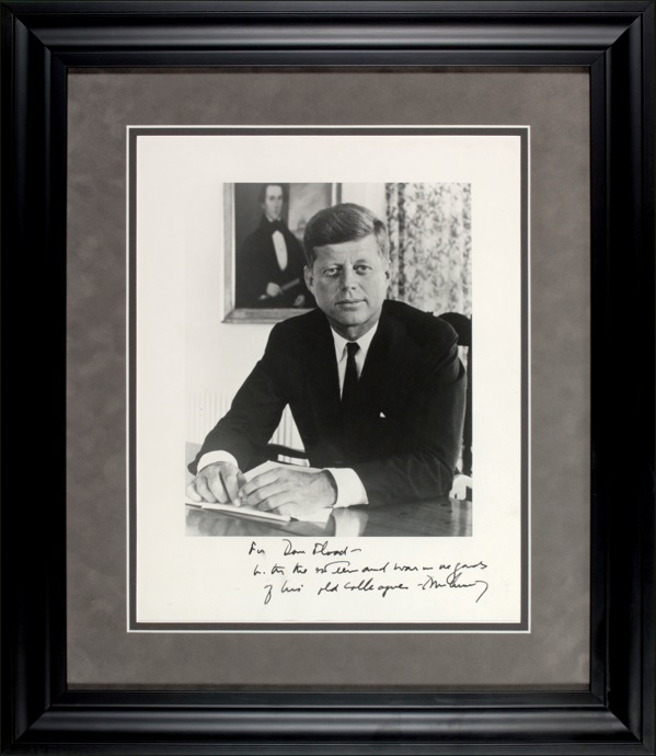 Lot 80 John F. Kennedy: FRIENDS IN LOW PLACES: JFK inscribes an oversized photo to Representative Daniel Flood, later forced to resign in a bribery scandal
