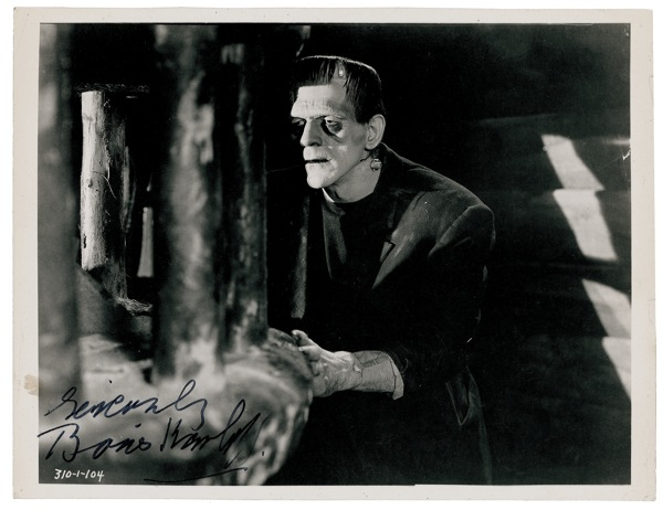 Lot 967 Boris Karloff: The man and the Monster: Karloff signs a photo in his most famous role