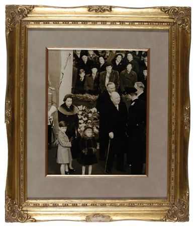 Lot #152 Winston Churchill: FOR QUEEN AND COUNTRY: CHURCHILL signs a photo featuring Elizabeth and the young future king - Image 1
