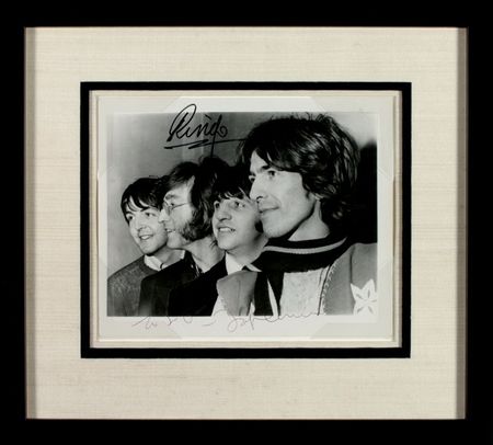 Lot #534 Beatles: Lennon and Starr: SEE HOW THEY SIGN: JOHN and RINGO sign a “Lady Madonna” promotional photo - Image 1