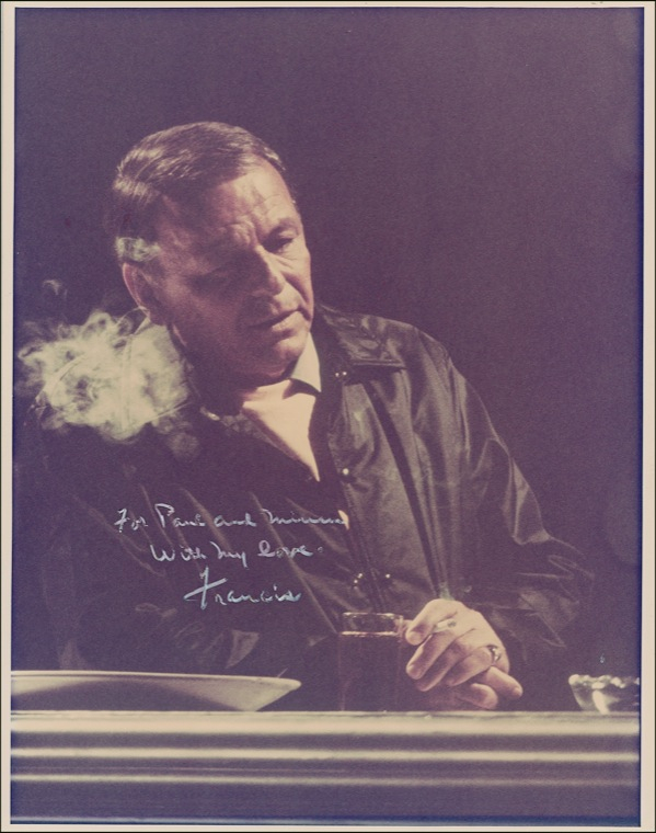Lot 624 Frank Sinatra: One for his baby? Sinatra signs an oversized photo