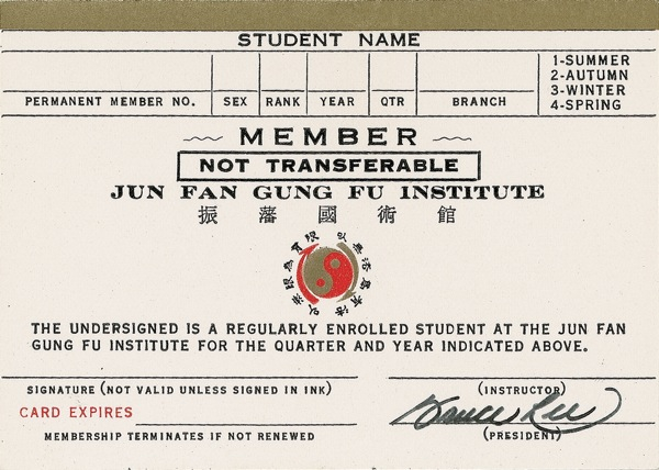 Lot 943 Bruce Lee: THE WAY OF THE INTERCEPTING FIST: Lee signs a membership card for his martial arts school