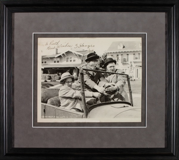 Lot 1105 Three Stooges: Wiseguys on wheels: Vintage Stooges photo signed by all three