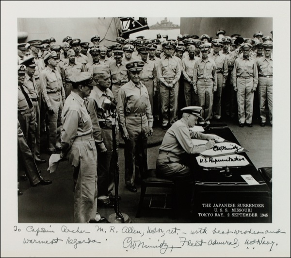 Lot 282 Chester W. Nimitz: AXIS DEFEATED: Superb photo of NIMITZ signing the Japanese surrender