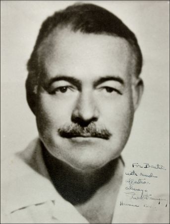 Lot #393 Ernest Hemingway: A TAMER LION: Scarce signed photo of Hemingway at the height of his later career, the year he won the Pulitzer Prize for The Old Man and the Sea - Image 1