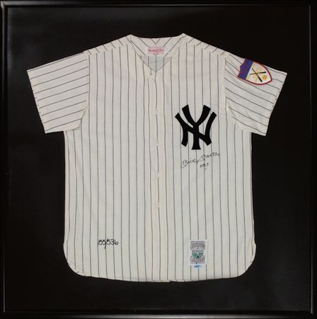 Lot #1312 Mickey Mantle: Mantle signs his now-difficult-to-find pinstripe Home Run jersey - Image 1