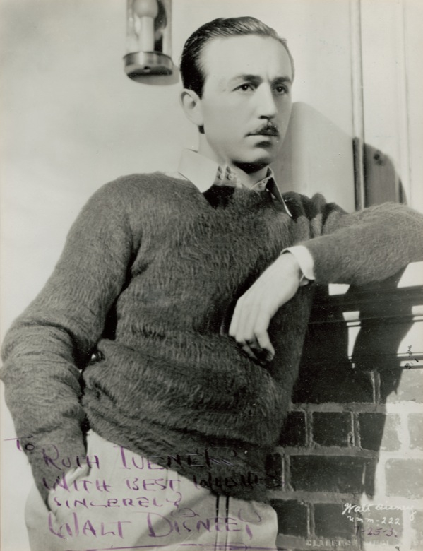 Lot 670 Walt Disney: CELLULOID EMPIRE: DISNEY signs a Bull photo for an early business associate