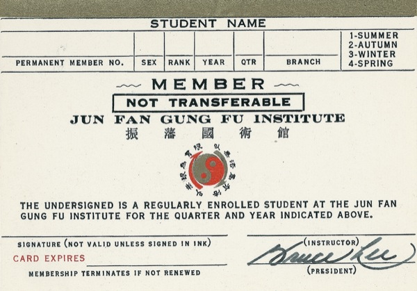 Lot 1108 Bruce Lee: FIST CLASS: Lee signs a membership card for his martial arts school