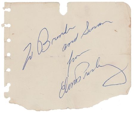 Lot #835 Elvis Presley: The ?King? signs for his fans - Image 1