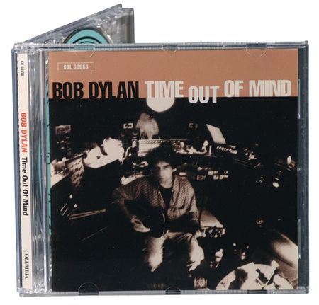 Lot #633 Bob Dylan: Dylan signs his Grammy award-winning Time Out of Mind - Image 1