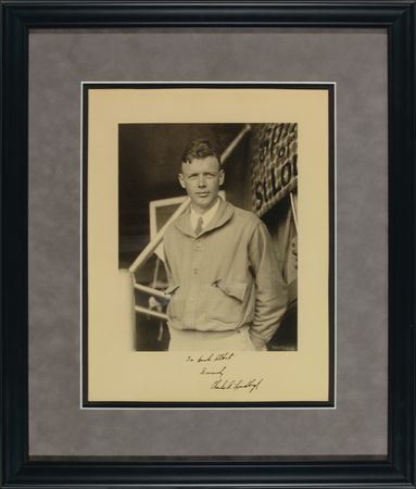 Lot #412 Charles Lindbergh: RIGHT WINGS: Exceptional oversized photo of LINDBERGH posing with the SPIRIT OF ST. LOUIS - Image 1