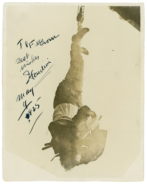 Lot 1099 Harry Houdini: GREAT ESCAPE: Dramatic performance photo signed by HOUDINI