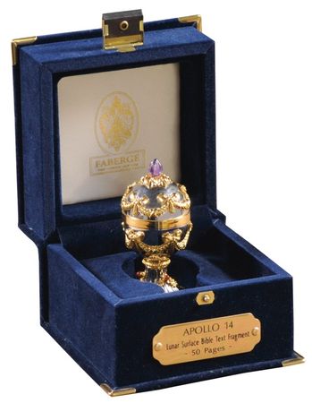 Lot #567 Edgar Mitchell: A LITTLE CLOSER TO HEAVEN: Scarce flown and astronaut-certified Bible text fragment, handsomely presented in a customized Fabergé egg - Image 1