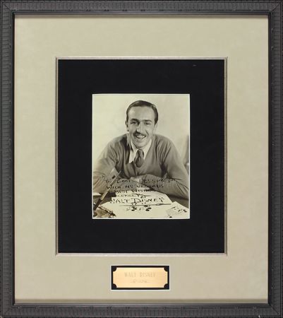 Lot #666 Walt Disney: OF MICE AND MAN: DISNEY inscribes an early photo - Image 1
