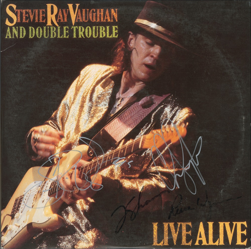 Lot 880 Stevie Ray Vaughan: Vaughan and his band sign Live Alive