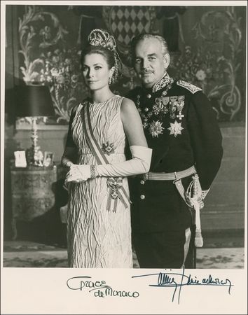Lot #808 Grace Kelly and Prince Rainier: AMERICAN PRINCESS: Superlative signed photo of GRACE and RAINIER, together with a swatch from her wedding dress, both with provenance from an MGM secretary - Image 1
