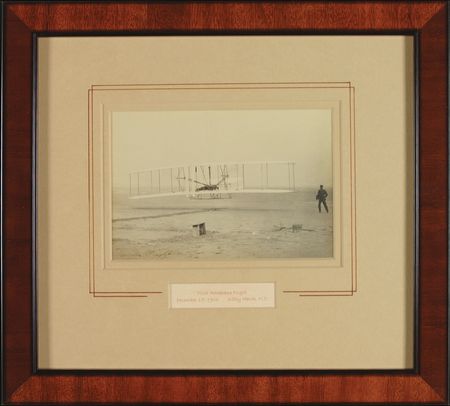 Lot #450 Orville Wright: Orville signs a photo of the Wrights’ historic first flight - Image 1