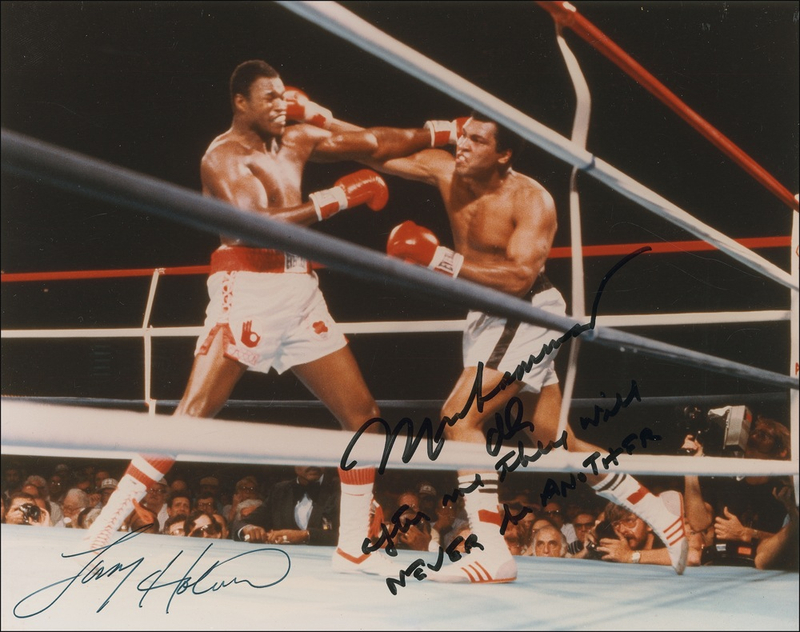 Lot 1416 Muhammad Ali and Larry Holmes Signed Photograph