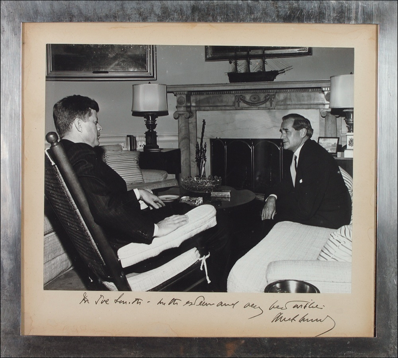 Lot 89 John F. Kennedy: President Kennedy signs for a member of his inner circle
