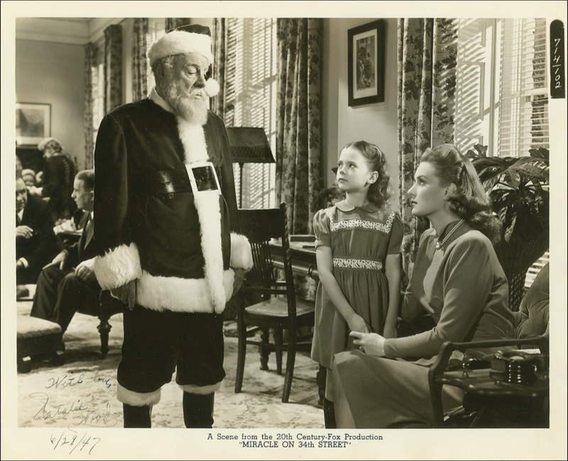 Lot 1137 Natalie Wood: “I believe... I believe... It's silly, but I believe”: Eight-year-old NATALIE WOOD signs an original still in the year she starred in MIRACLE ON 34TH STREET