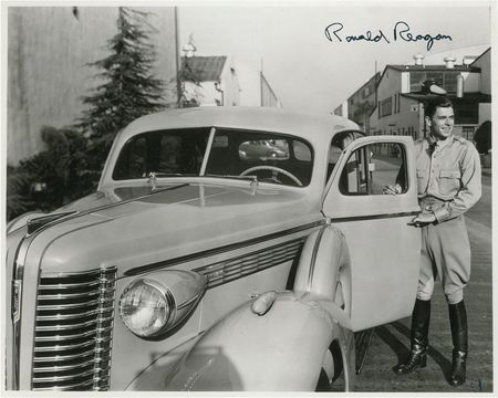 Lot #111 Ronald Reagan: Most Likely to Succeed: Reagan signs for a grade-school classmate - Image 1