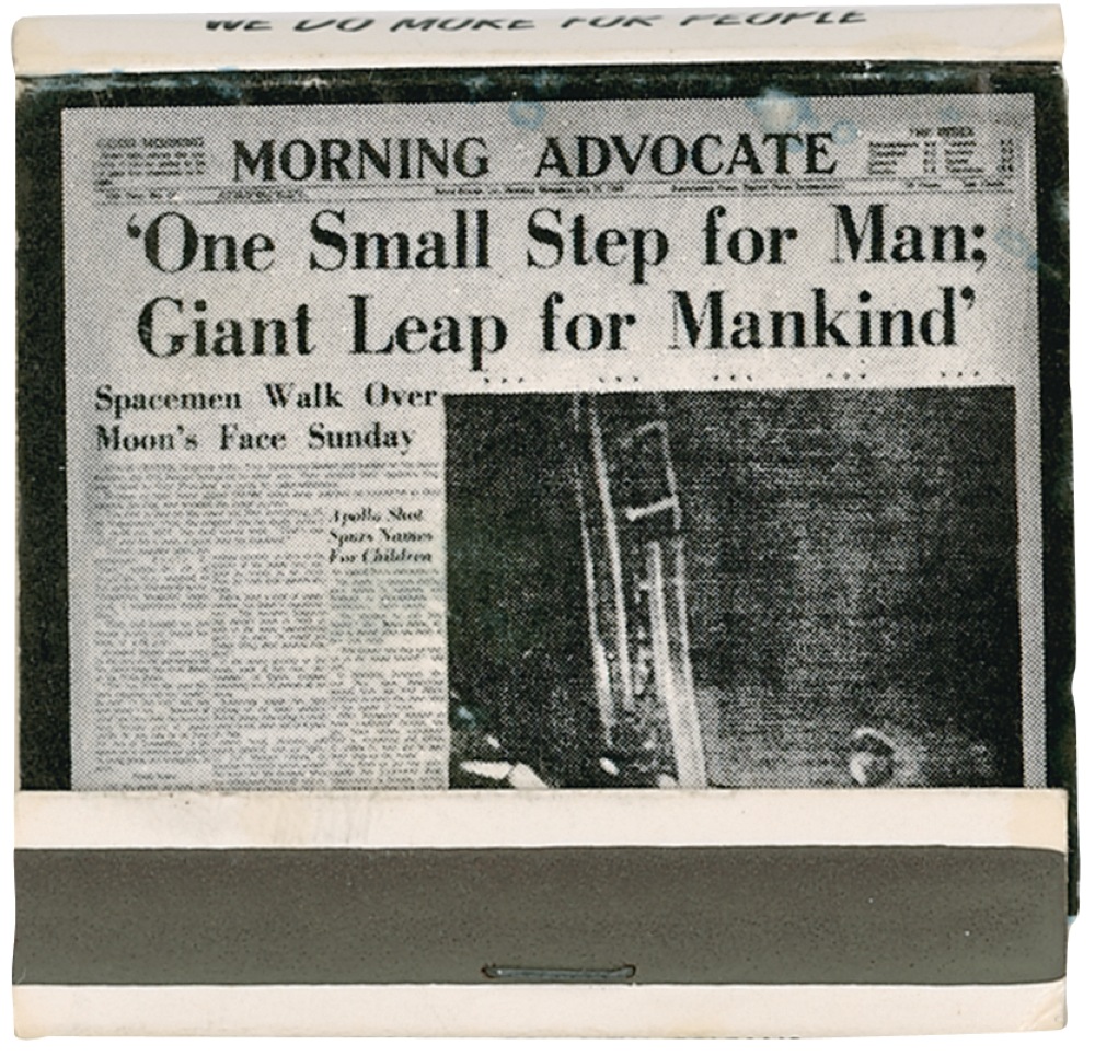 Lot 516 Neil Armstrong: Signing a commemorative matchbook
