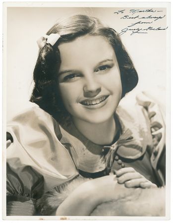 Lot #1107 Judy Garland: A star is born! Fourteen year old Garland signs a gorgeous Bull portrait - Image 1