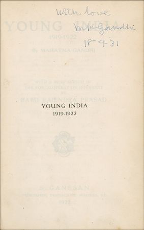 Lot #224 Mohandas Gandhi: Gandhi signs an important work while lobbying for independence - Image 1