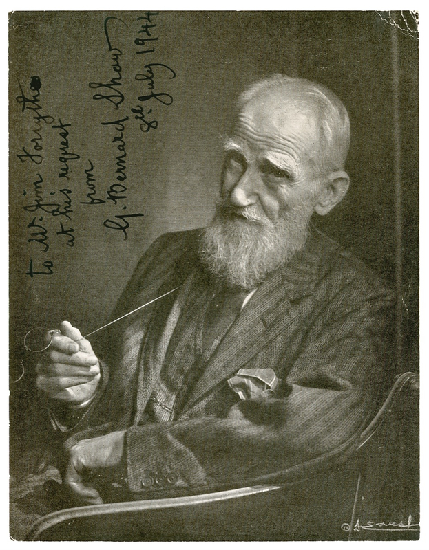 Lot 549 George Bernard Shaw: Shaw signs his Karsh portrait