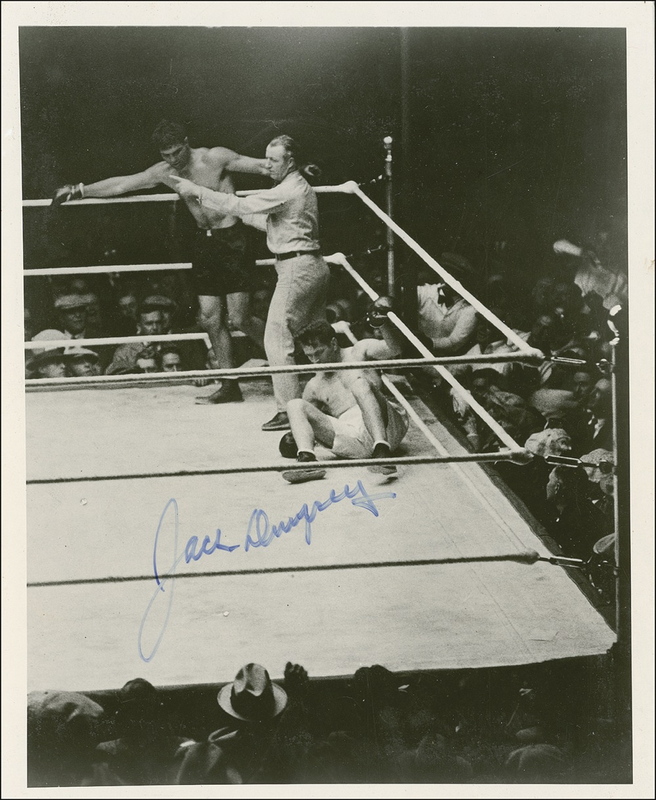 Lot 1212 Jack Dempsey: Dempsey signed photo of the legendary long count ... with an original ringside seat ticket stub for the fight!