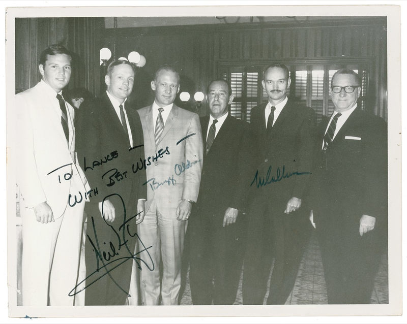 Lot 395 Apollo 11: Fresh from the moon the Apollo 11 crew pose at their first post-quarantine function