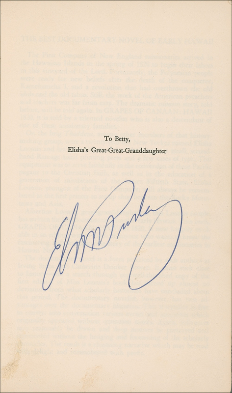 Lot 765 Elvis Presley: Presley signs a paperback for an Hawaiian fan