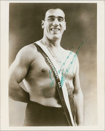 Lot #1196 Primo Carnera: Scarce signed photo of heavyweight boxing’s “Ambling Alp” - Image 1