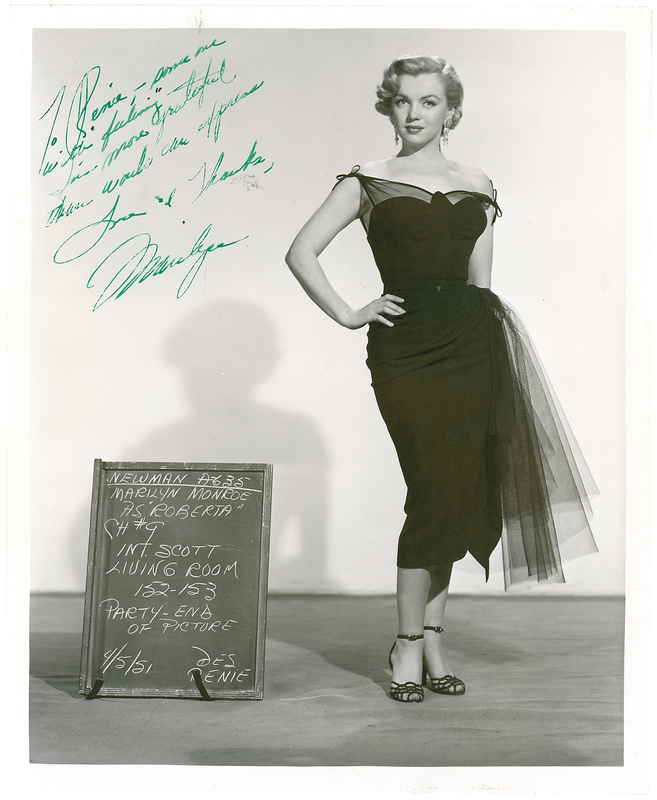 Lot 1006 Marilyn Monroe: Marilyn signs a costume test shot for prominent Hollywood designer Renie Conley
