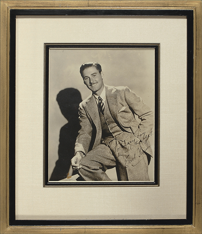 Lot 933 Errol Flynn Signed Photograph