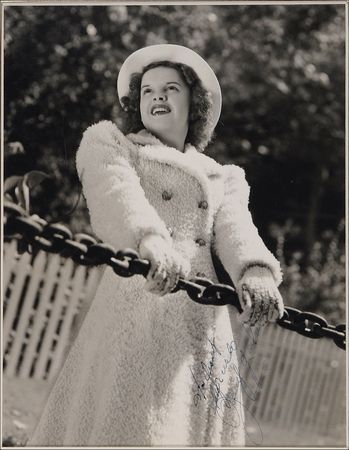 Lot #944 Judy Garland: Youthful Garland pose from around the time of The Wizard of Oz - Image 1