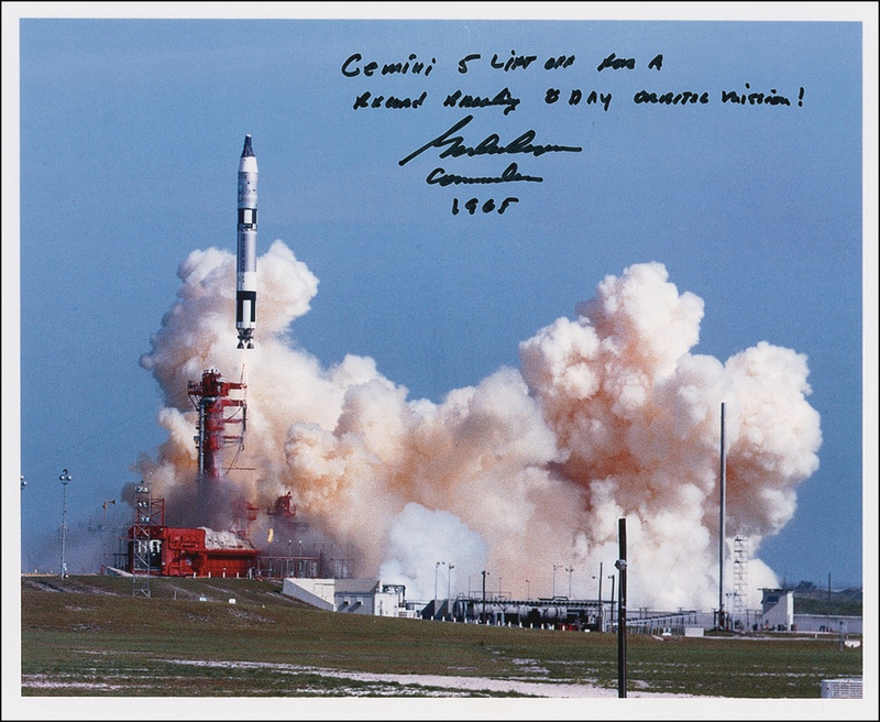 Lot 468 Gordon Cooper: Cooper proudly signs a Gemini 5 photo