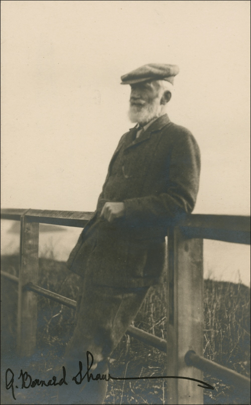 Lot 632 George Bernard Shaw: Shaw signs an outdoor portrait