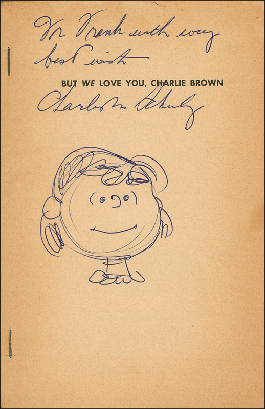 Lot 686 Charles Schulz: Schulz signs a Peanuts book adding a scarce sketch of Lucy