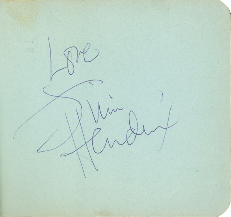Lot 767 Jimi Hendrix: Hendrix signs in the fall of ?68, complete with candid photo