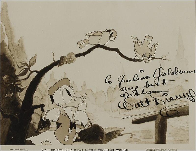 Lot 639 Walt Disney: The great Donald Duck creator signs a movie still from a 1940 animated short