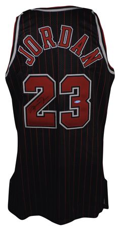 Lot #1239 Michael Jordan: Alternate Bulls black jersey - Image 1