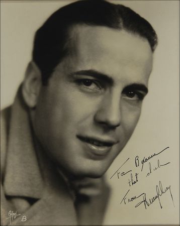 Lot #984 Humphrey Bogart: An extremely early Bogie photo inscribed to a “dish” of a startlet - Image 1