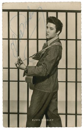 Lot #811 Elvis Presley: Elvis twice signs a Jailhouse Rock photo - Image 1