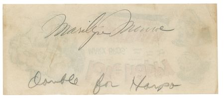 Lot #1016 Marilyn Monroe: An orphan herself, Marilyn makes a live appearance for the Marx Brothers film ‘Love Happy,’ with several Illinois youngsters - Image 1